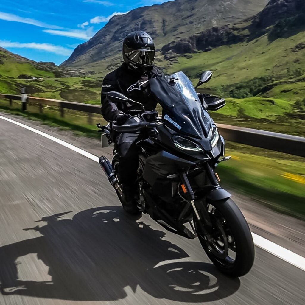 Man on a bike driving in England
